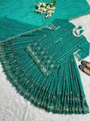 Wedding Wear Aqua Green Georgette With Design Suit Set