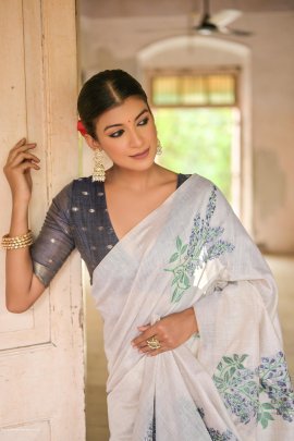 White and Blue Premium soft muga Cotton saree with unique floral weaving pattern