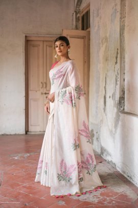 White and Orange Premium soft muga Cotton saree with unique floral weaving pattern