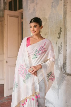 White and Orange Premium soft muga Cotton saree with unique floral weaving pattern