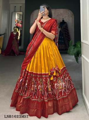 Yellow Elegant Dola Silk Patola Lehenga Choli by fab funda