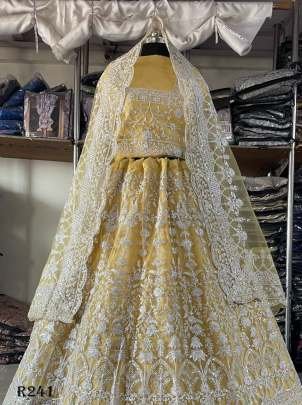 Yellow Exclusive Heavy Butterfly Net Bridal Lehenga Choli