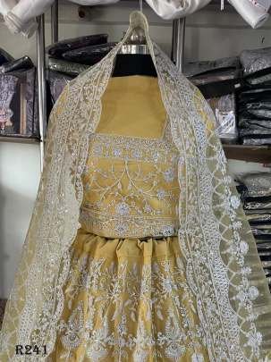 Yellow Exclusive Heavy Butterfly Net Bridal Lehenga Choli